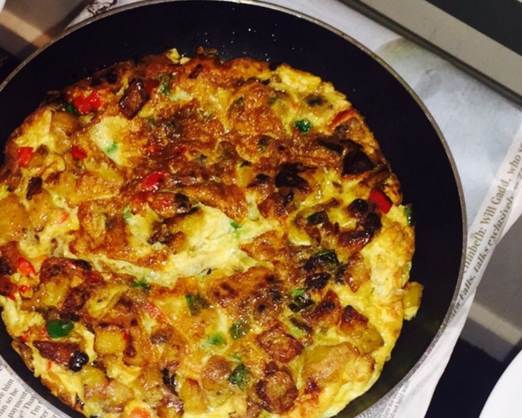 plantain frittata cooked in a frying pan 