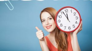 woman holding clock