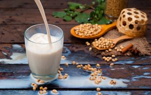 Tiger nut milk splash with beans on wood