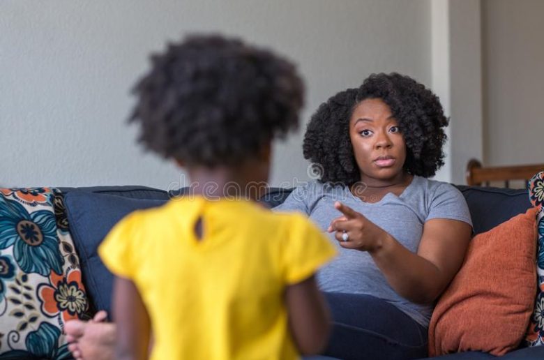 African mum disciplines her child