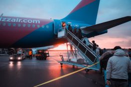 passengers boarding a plane - trip by air.
