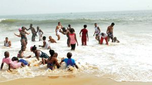 Friends playing in the Beach