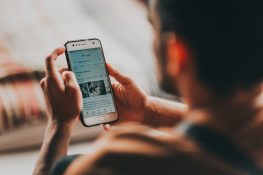 -man-surfing-internet-on-smartphone-at-home