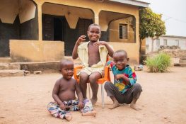children posing-in-a-village (Malaria Prevention in Children)