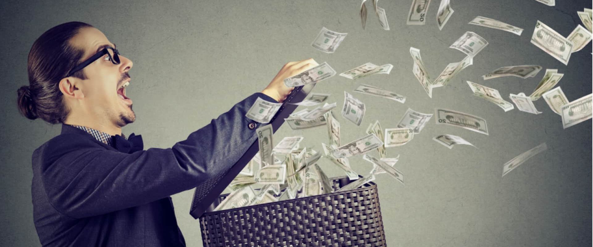 Graphic of a man wasting money. Source: The Frugal Xpat